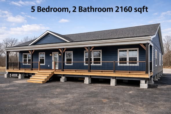 Single-story blue house with a wooden porch, featuring five bedrooms and two bathrooms. It's situated on a lot with a clear blue sky. Text reads "5 Bedroom, 2 Bathroom 2160 sqft."