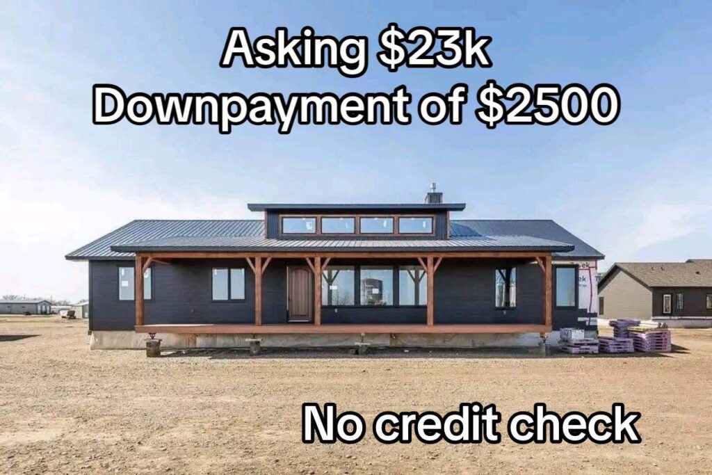 A modern, single-story house with a wooden porch on a barren lot. Text overlay: "Asking $23k, Downpayment of $2500, No credit check."