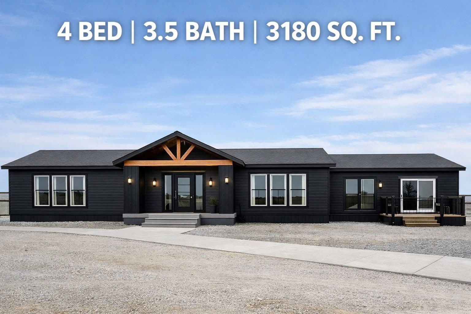 Modern black house with gable roof, large windows, and front porch against a clear sky. Text above reads "4 Bed | 3.5 Bath | 3180 Sq. Ft."
