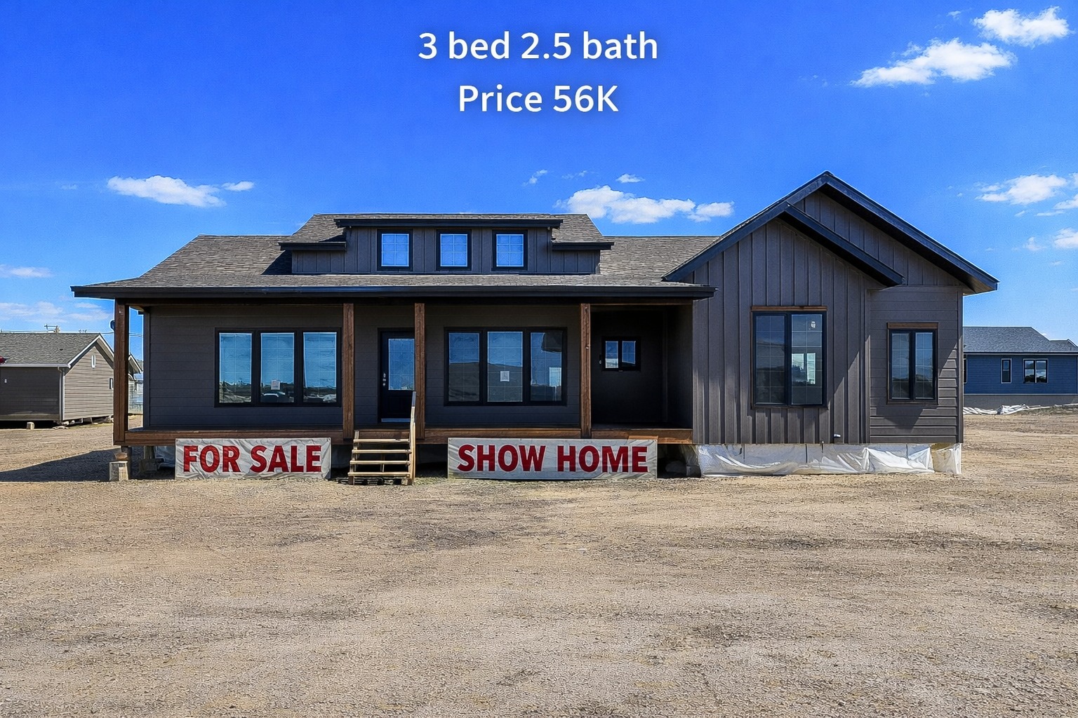 Single-story house with a pitched roof, labeled "3 bed 2.5 bath, Price 56K." "For Sale" and "Show Home" banners hang above the porch. Clear blue sky.
