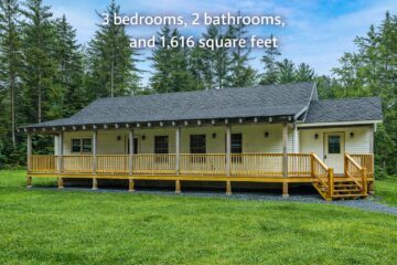 Cozy beige one-story house with a wraparound porch, surrounded by trees. Text above reads "3 bedrooms, 2 bathrooms, and 1,616 square feet."