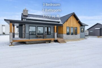 Modern house on snowy ground with wooden accents, large windows, and a metal roof. Text overlay: "3 Bedroom, 2 Bathroom, 1,770 sq. ft."