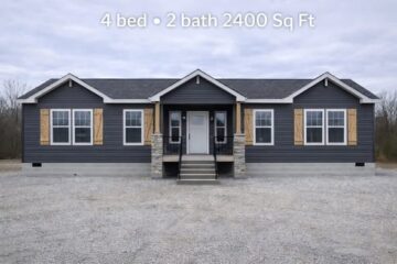 Gray single-story house with stone accents and wooden shutters, featuring four beds and two baths, 2400 sq ft. Overcast sky, gravel yard.